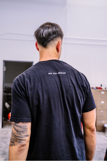 We Are Driven Embroidered Tee