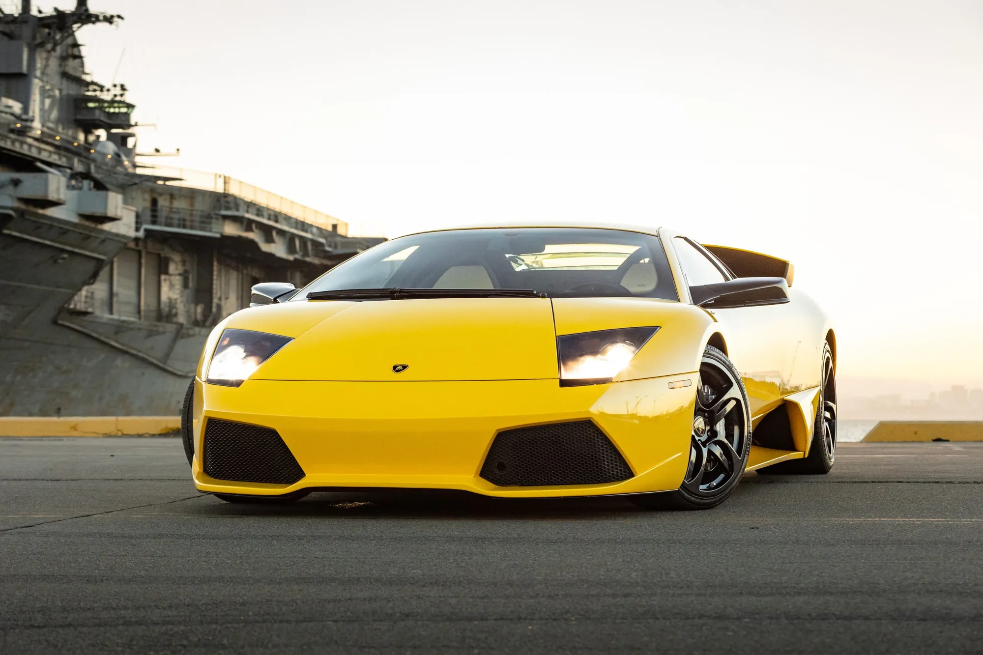 Yellow Lamborghini Murciélago LP640 at sunset